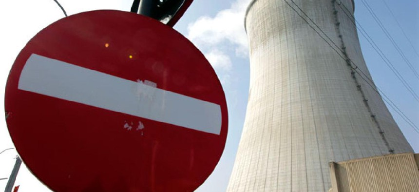 Steam is emitted from the cooling tower at the nuclear power plant in Tihange, Southeast of Brussels. 