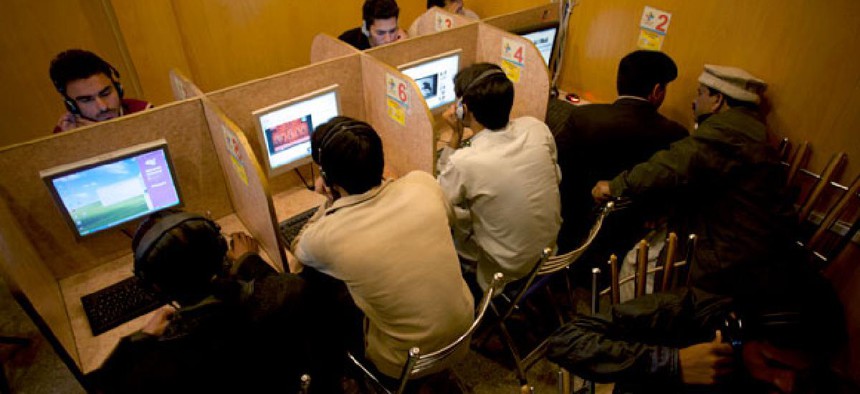 People use the Internet at a local cafe in Islamabad, Pakistan.