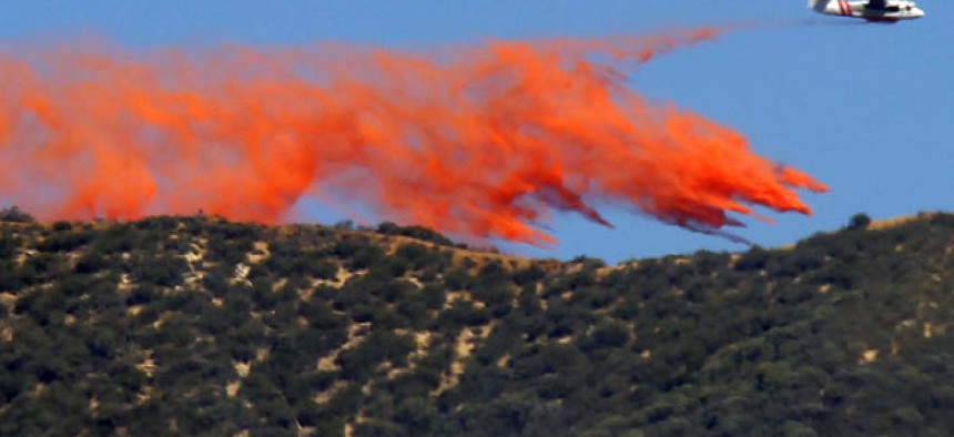 A tanker makes a slurry drop onto a 1,400-acre wildfire northeast of Castaic, Calif.,  in May.