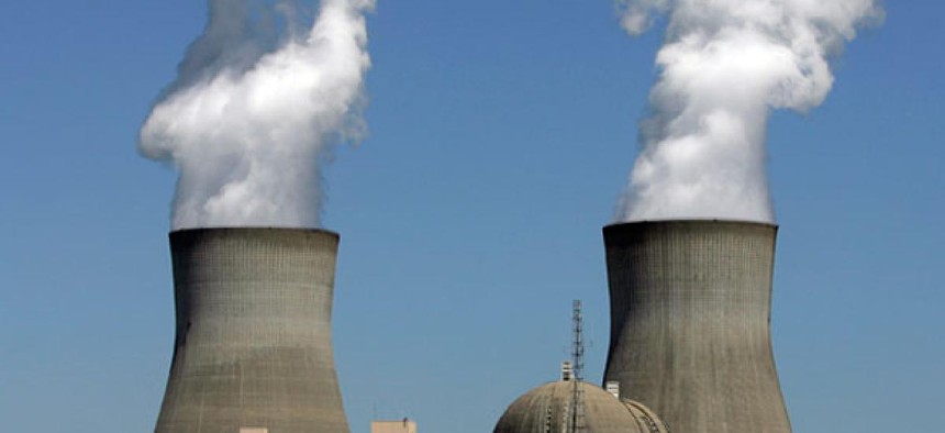 Steam rises from the cooling towers of nuclear reactors at Plant Vogtle, in Waynesboro, Ga. 