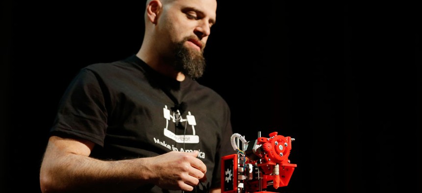 Brook Drum, the founder and CEO of Printrbot, displays and talks about his $299 portable 3D printer during the Hardware Innovation Workshop in San Mateo, Calif. 