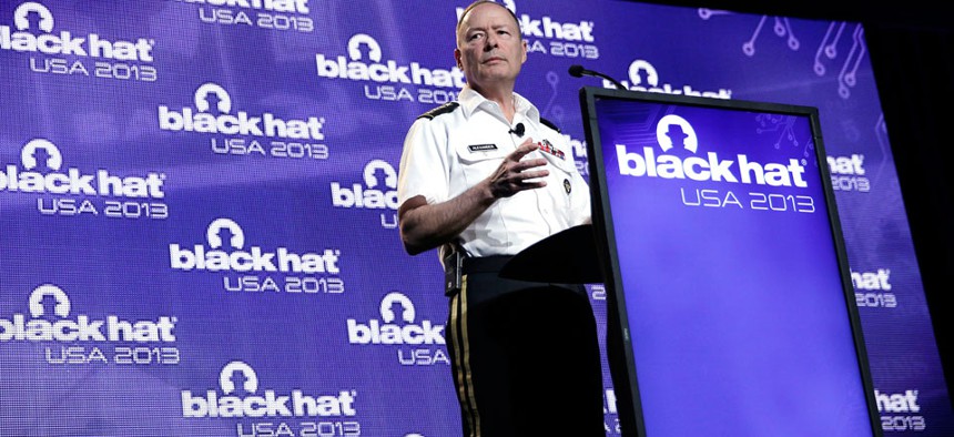 Army General Keith Alexander, head of the National Security Agency delivers a keynote address at the Black Hat hacker conference. 