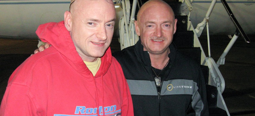 Expedition 26 Commander Scott Kelly, left, is reunited with his twin brother, Mark Kelly after 157 days on the International Space Station in March 2010. 