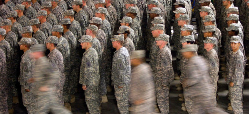 Members of the 1st Infantry Division fall in for a re-deployment ceremony upon return from Iraq to Fort Riley in 2009.