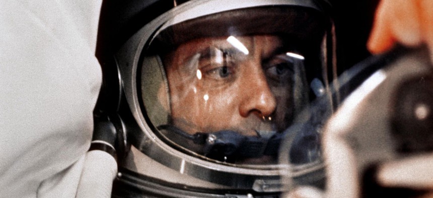 Astronaut Alan Shepard sits in his Freedom 7 Mercury capsule, ready for launch.