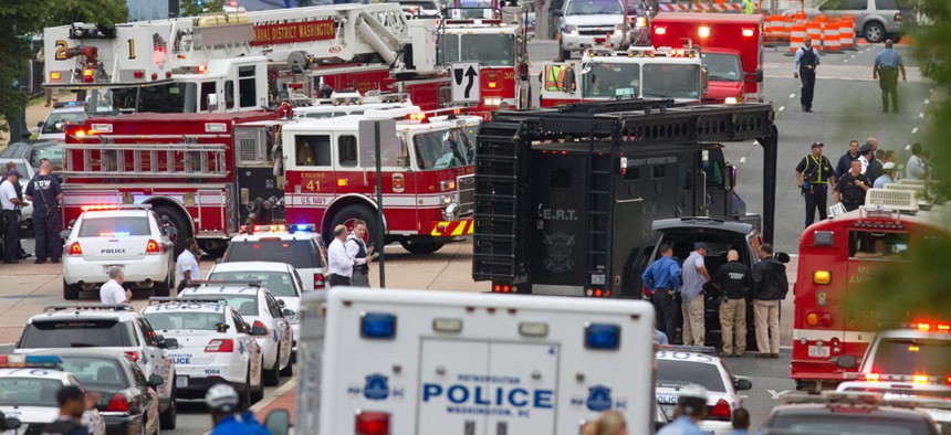 Emergency Response Team vehicles arrive to the scene at the Washington Navy Yard.