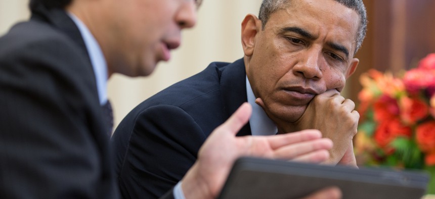 Todd Park shows Barack Obama information on a tablet computer in April.