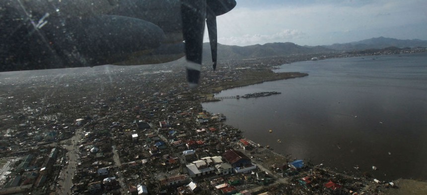The view from a US C-130 transport plane from the United States Marines shows the  destruction of typhoon Haiyan.