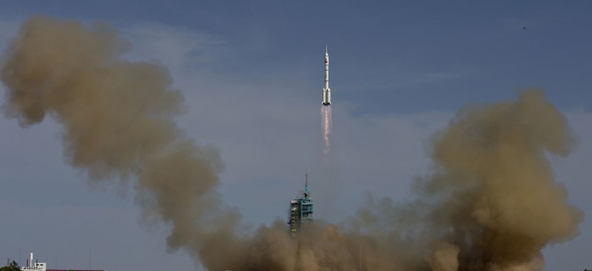 The Long March 2F rocket carrying the Shenzhou 10 capsule blasts off from the Jiuquan Satellite Launch Center Jiuquan in June.