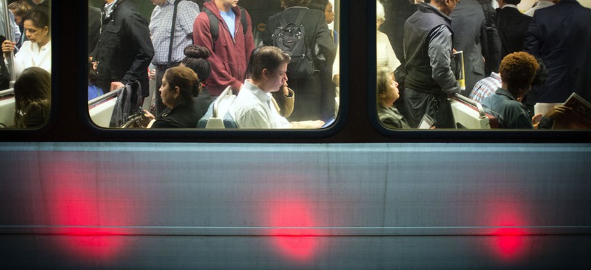 Passengers fill up Washington Metro subway cars in Arlington, Va.
