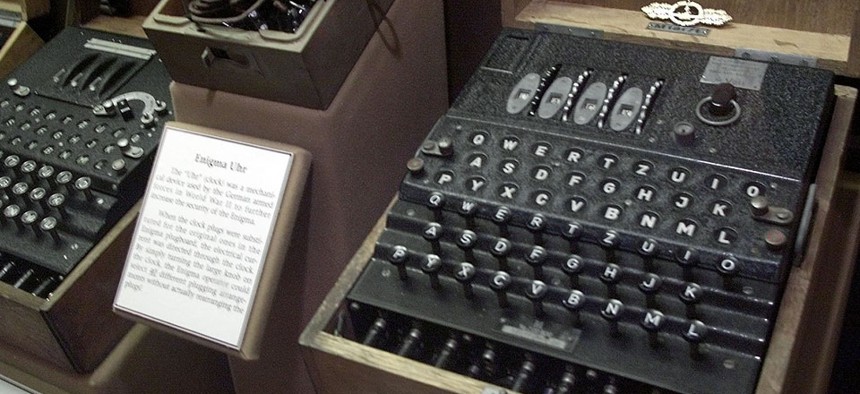 The Enigma machine, right, once used by the crews of German U-boats is shown in a British museum.