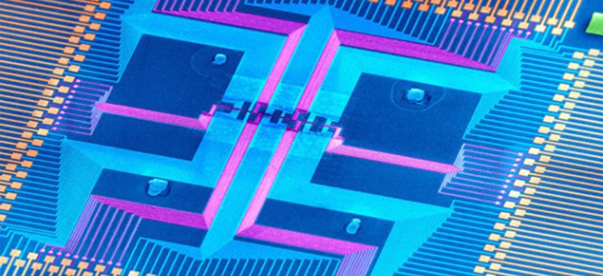The DNA-sized nanowires in the center of this magnified chip could keep the electronics industry from burning out.