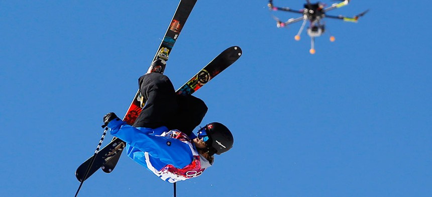 A drone camera follows Norway's Aleksander Aurdal during the men's ski slopestyle final at the 2014 Winter Olympics.