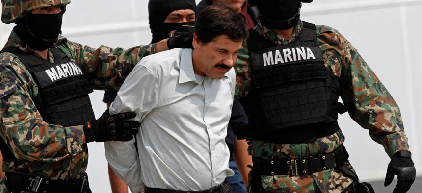 Joaquin "El Chapo" Guzman, seen here being escorted to a helicopter in Mexico City,  was apprehended in Mazatlán, Sinaloa Saturday.