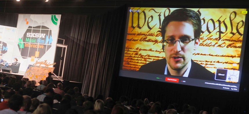 Edward Snowden talks during a simulcast conversation during the SXSW Interactive Festival on Monday, March 10, 2014.