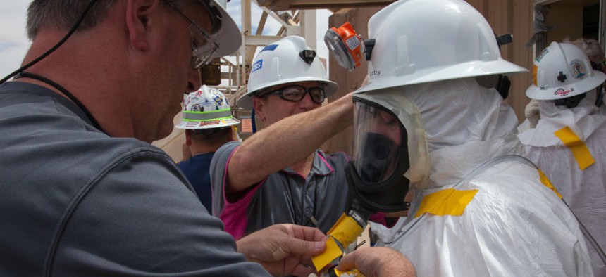Workers preparing to enter the Waste Isolation Pilot Plant facility in Carlsbad, N.M., for the first time since the February 14 radiological release. 