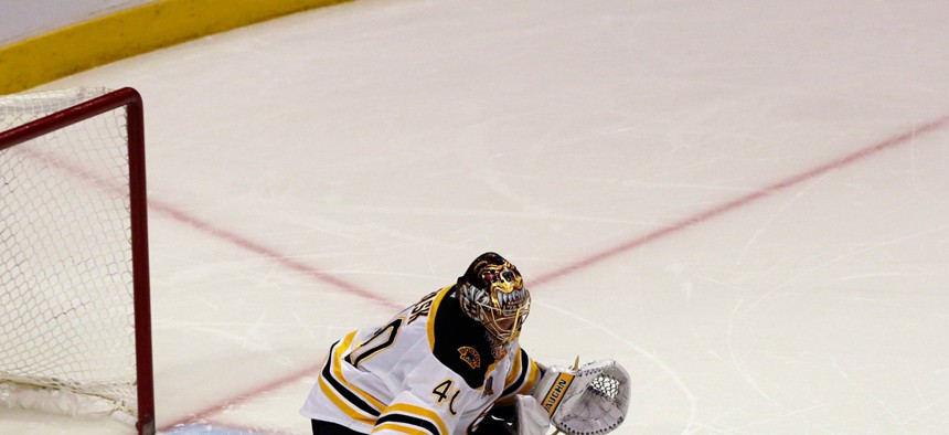 Chicago Blackhawk forward Patrick Kane scores against Boston Bruins goalie Tuukka Rask in a January game. 