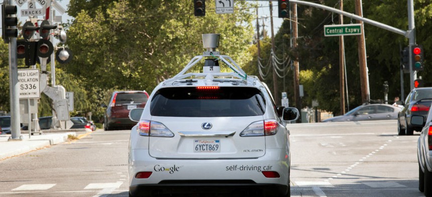 The Google driverless car navigating along a street in Mountain View, Calif. 