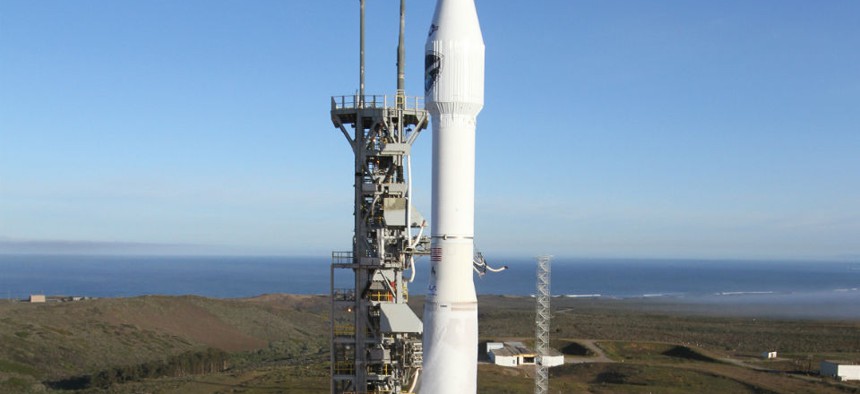 The Atlas V rocket carrying the Defense Meteorological Satellite Program-19 spacecraft Thursday April 3, 2014.