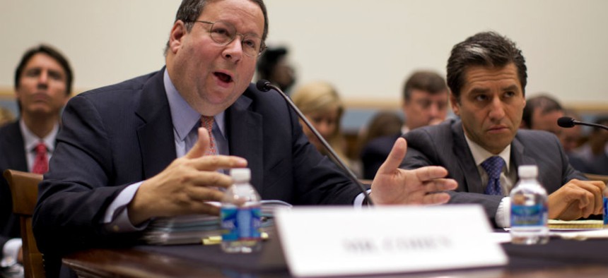 David Cohen, Executive Vice President, Comcast Corporation, left, testifies with Robert Marcus, Chairman and CEO, Time Warner Cable at a hearing on the proposed merger of the two companies.