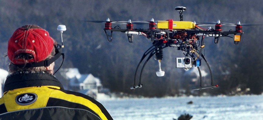 Steve Capachietti pilots his drone with video camera attached on the bottom while taking video.