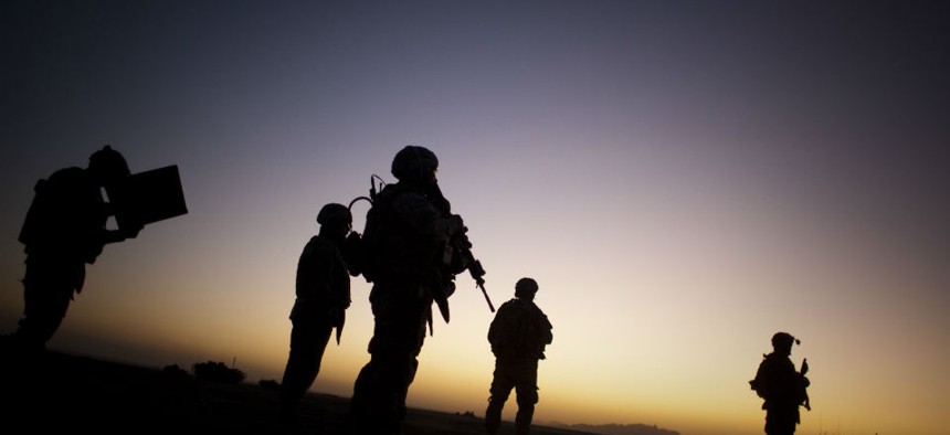 U.S. soldiers patrol the outskirts of Spin Boldak, near the border with Pakistan, about 100 kilometers (63 miles) southeast of Kandahar, Afghanistan.