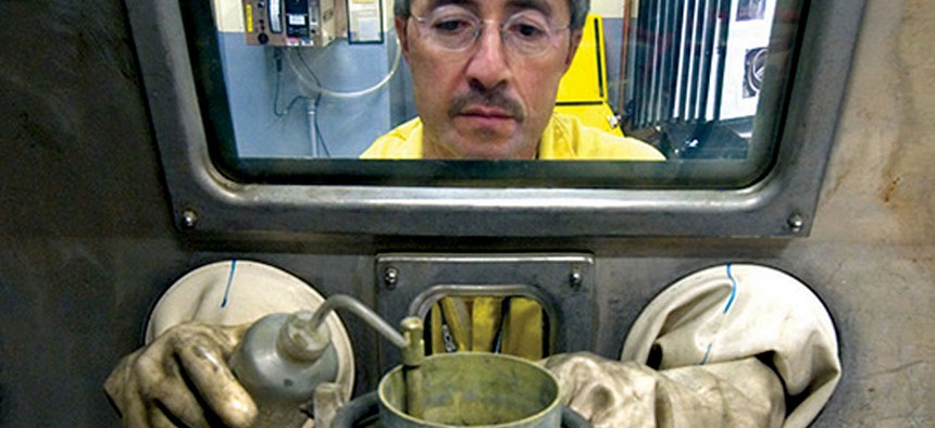 Plutonium pits for the U.S. nuclear arsenal are cast at Los Alamos National Laboratory in 2005.