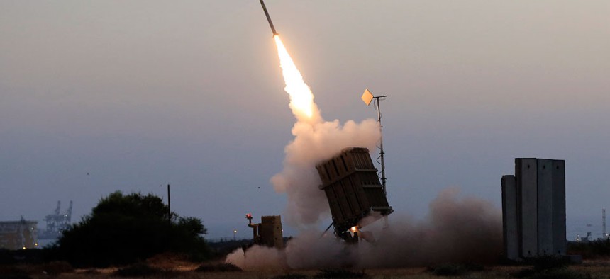 An Iron Dome air defense system fires to intercept a rocket from Gaza Strip in the costal city of Ashkelon, Israel. 