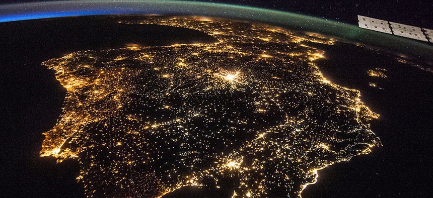 The Iberian Peninsula at night, showing Spain and Portugal. Madrid is the bright spot just above the center.