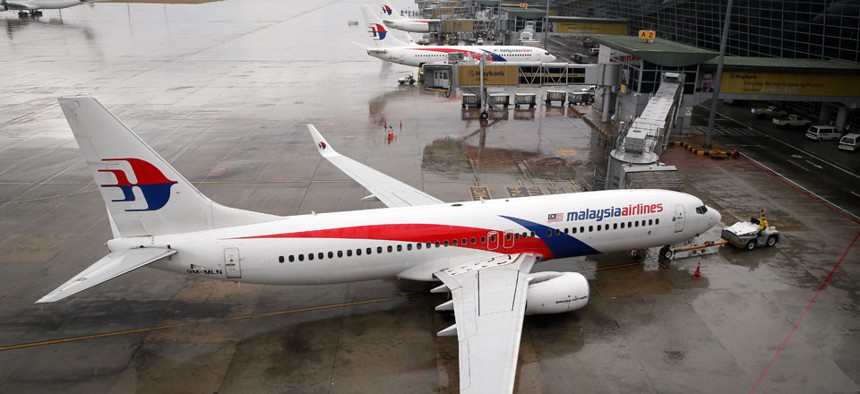 A Malaysia Airlines Boeing 737-800 plane sits on tarmac at Kuala Lumpur International Airport in Sepang, Malaysia.