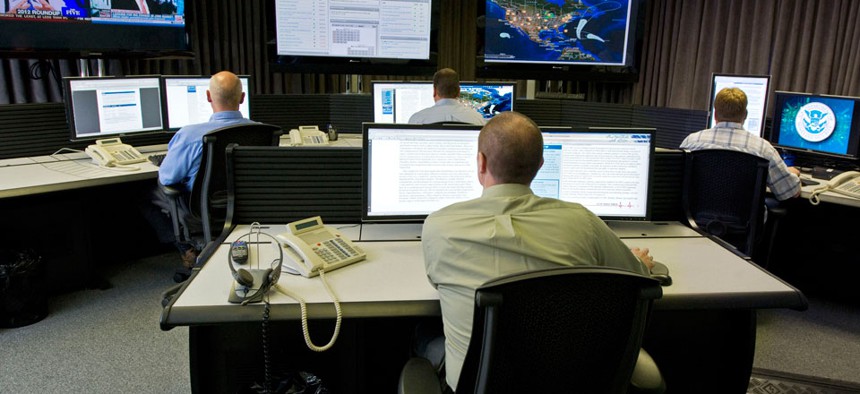Cyber security analysts work in the "watch and warning center" during the first tour of the government’s secretive cyber defense lab, in Idaho Falls, Idaho. 