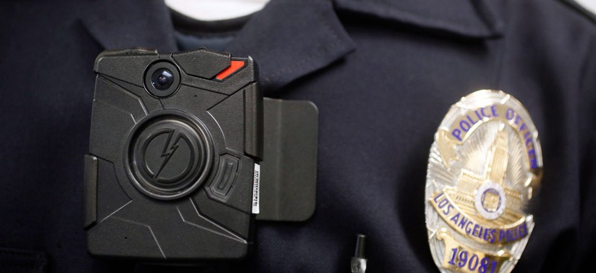 A Los Angeles Police officer wearing an on-body cameras during a demonstration for media in Los Angeles. 