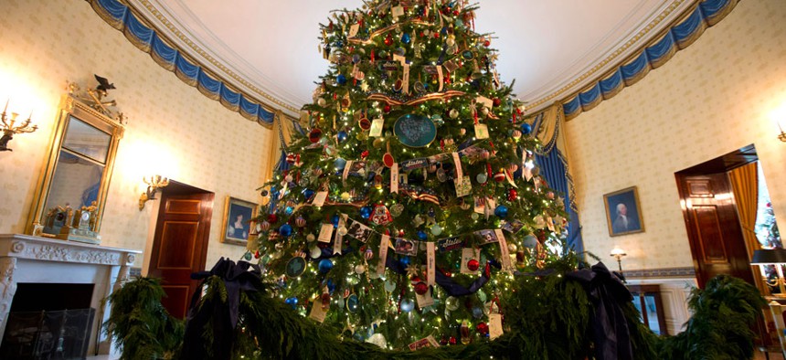 The White House Christmas tree is seen in the Blue Room of the White House in Washington, on Wednesday, Dec. 4, 2013.