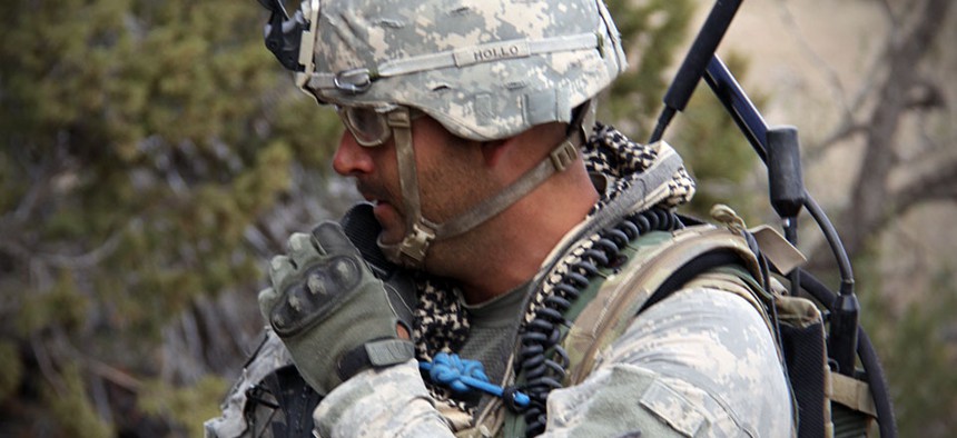 A Soldier from 2nd Brigade, 1st Armored Division, uses a Joint Tactical Radio System's Handheld, Manpack and Small Form Fit, known as JTRS HMS, at the Army's Network Integration Evaluation, or NIE 13.1, on Nov. 9, 2012. 