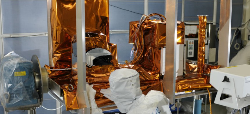 The Ozone Mapping and Profiler Suite (OMPS) instrument, part of the JPSS satellite system, undergoes post thermal inspection at a Ball facility in Boulder, Colo.