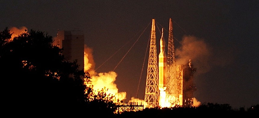 A Delta IV Heavy rocket lifts off from Space Launch Complex 37 at Cape Canaveral Air Force Station in Florida carrying NASA's Orion spacecraft on an unpiloted flight test to Earth orbit.