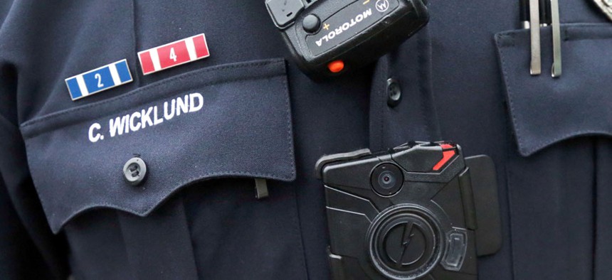 Burnsville Police Department Sgt. Chris Wicklund wears a camera beneath his microphone.