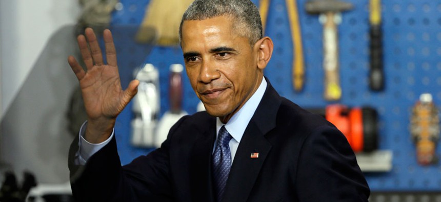 President Barack Obama waves to the crowd after speaking at Cedar Falls Utilities, Wednesday, Jan. 14, 2015, in Cedar Falls, Iowa.