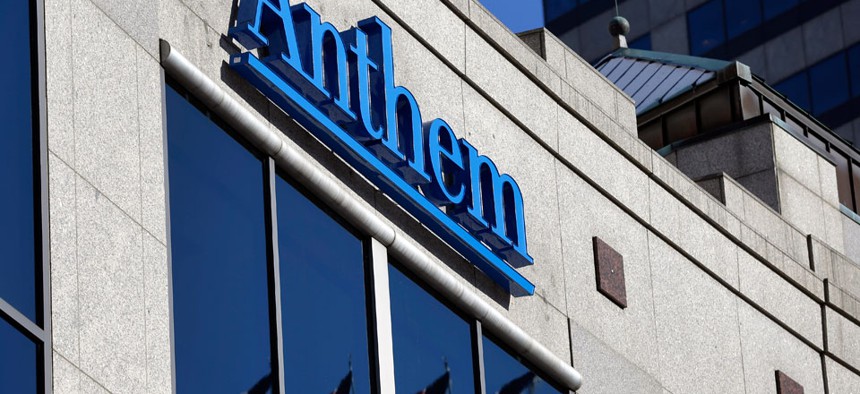 The Anthem logo hangs at the health insurer's corporate headquarters in Indianapolis.