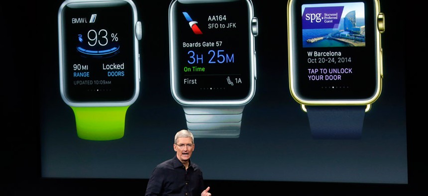 Apple CEO Tim Cook discusses the new Apple Watch during an event at Apple headquarters on Thursday, Oct. 16, 2014 in Cupertino, Calif. 