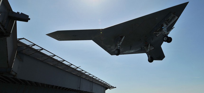 A naval Unmanned Carrier Launched Surveillance and Strike aircraft (UCLASS) takes off.