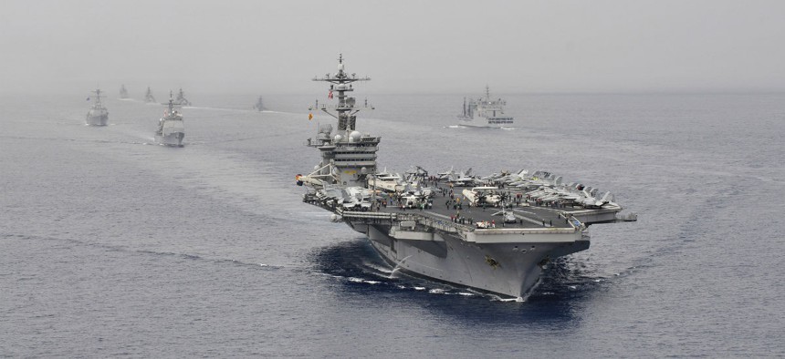 USS Carl Vinson and U.S. and Indian navy ships in an April 2012 passing exercise. 