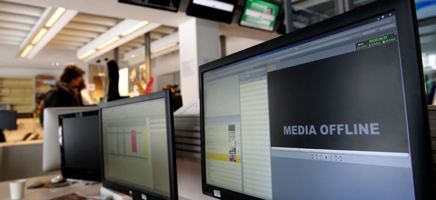 Computer screens are pictured at TV5 Monde after the French television network was hacked by people claiming allegiance to the Islamic State group, in Paris, France.