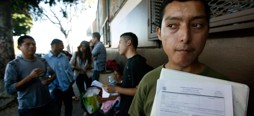 Illegal immigrant Layios Roberto waits outside the offices of Coalition for Humane Immigrant Rights in Los Angeles Wednesday, Aug. 15, 2012. 