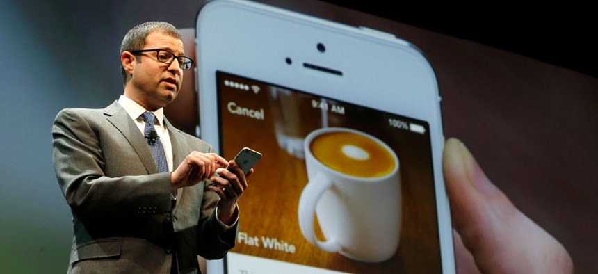 Adam Brotman, Starbucks chief digital officer, talks about the company's new mobile ordering app Wednesday, March 18, 2015.