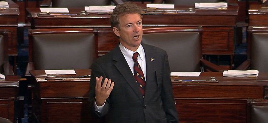 Sen. Rand Paul, R-Ky., and a Republican presidential contender, speaks on the floor of the U.S. Senate Wednesday afternoon, May 20, 2015, at the Capitol in Washington, during a long speech opposing renewal of the Patriot Act.