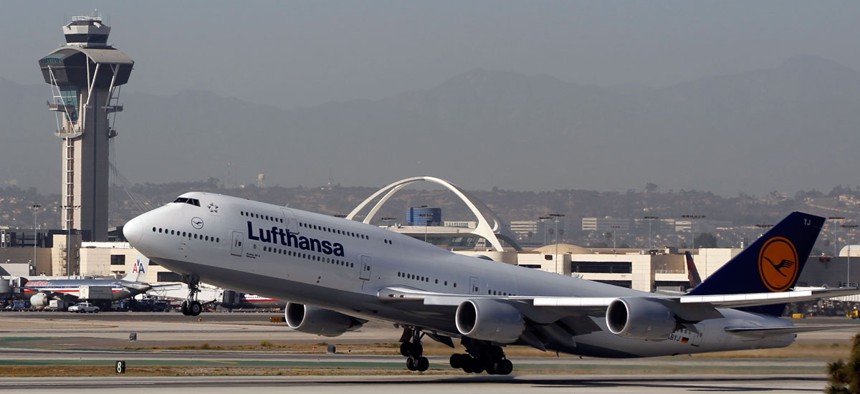 A Lufthansa Boeing 747-830, takes off from the south runaway at the Los Angeles International Airport.