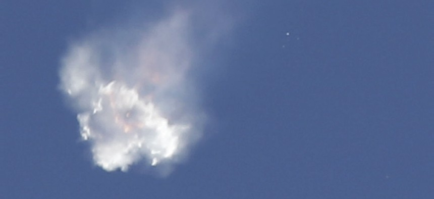 The SpaceX Falcon 9 rocket and Dragon spacecraft breaks apart shortly after liftoff at the Cape Canaveral Air Force Station in Cape Canaveral, Florida, Sunday, June 28, 2015. The rocket was carrying supplies to the International Space Station.