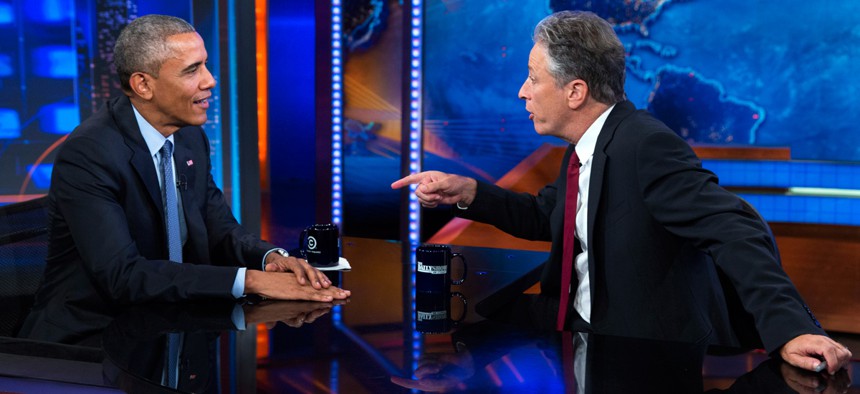 President Barack Obama, left, talks with Jon Stewart, host of "The Daily Show" during a taping on Tuesday, July 21, 2015.