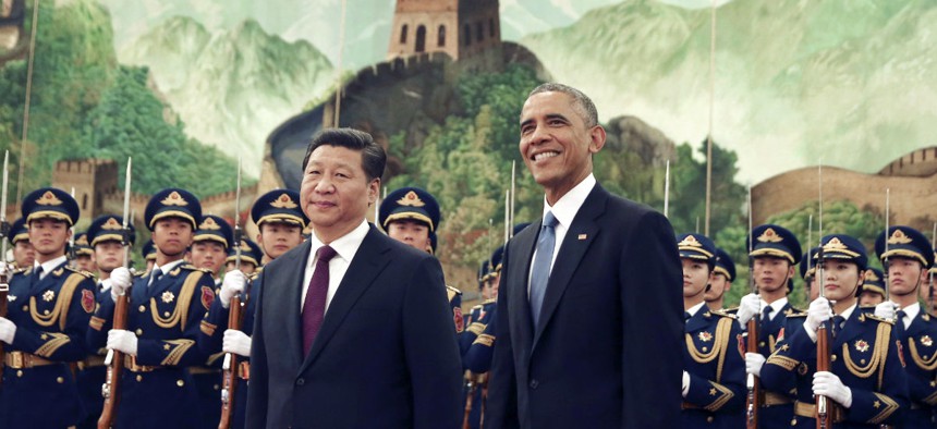 President Barack Obama and Chinese President Xi Jinping at the Great Hall of the People in Beijing, China in 2014. 